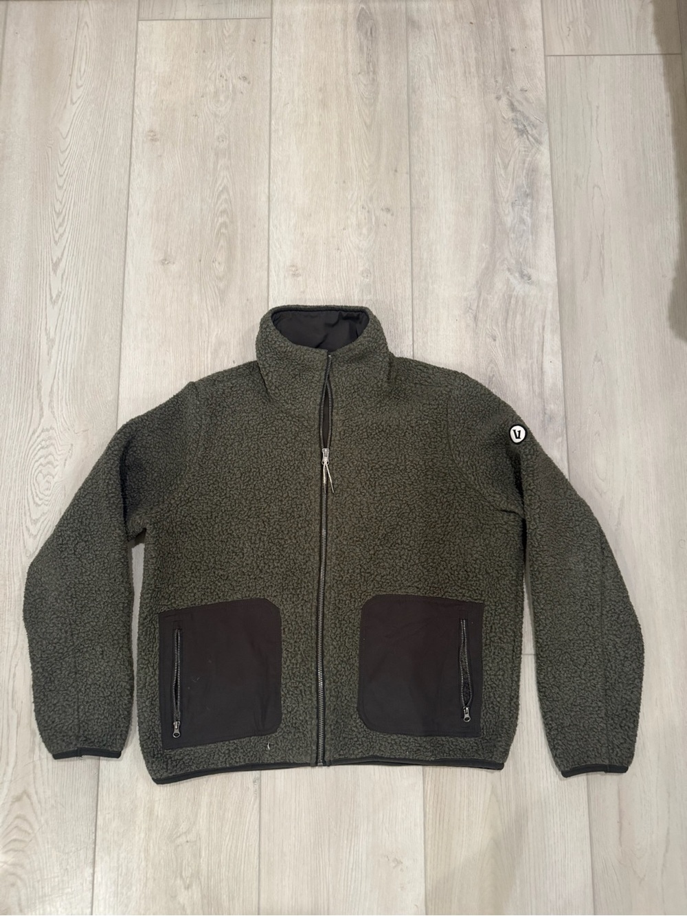 Women’s green alpine Sherpa jacket
